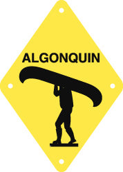 black silhouette of Person Portaging Canoe word Algonquin on bright yellow diamond-shaped background with holes in four corners, approx 17cm/6.65